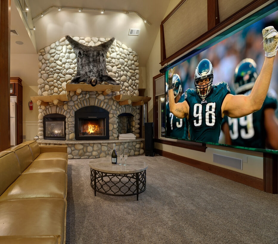 Huge 16 feet TV rolls down over the ski slope views for watching movies and sports in high definition with Surround Sound